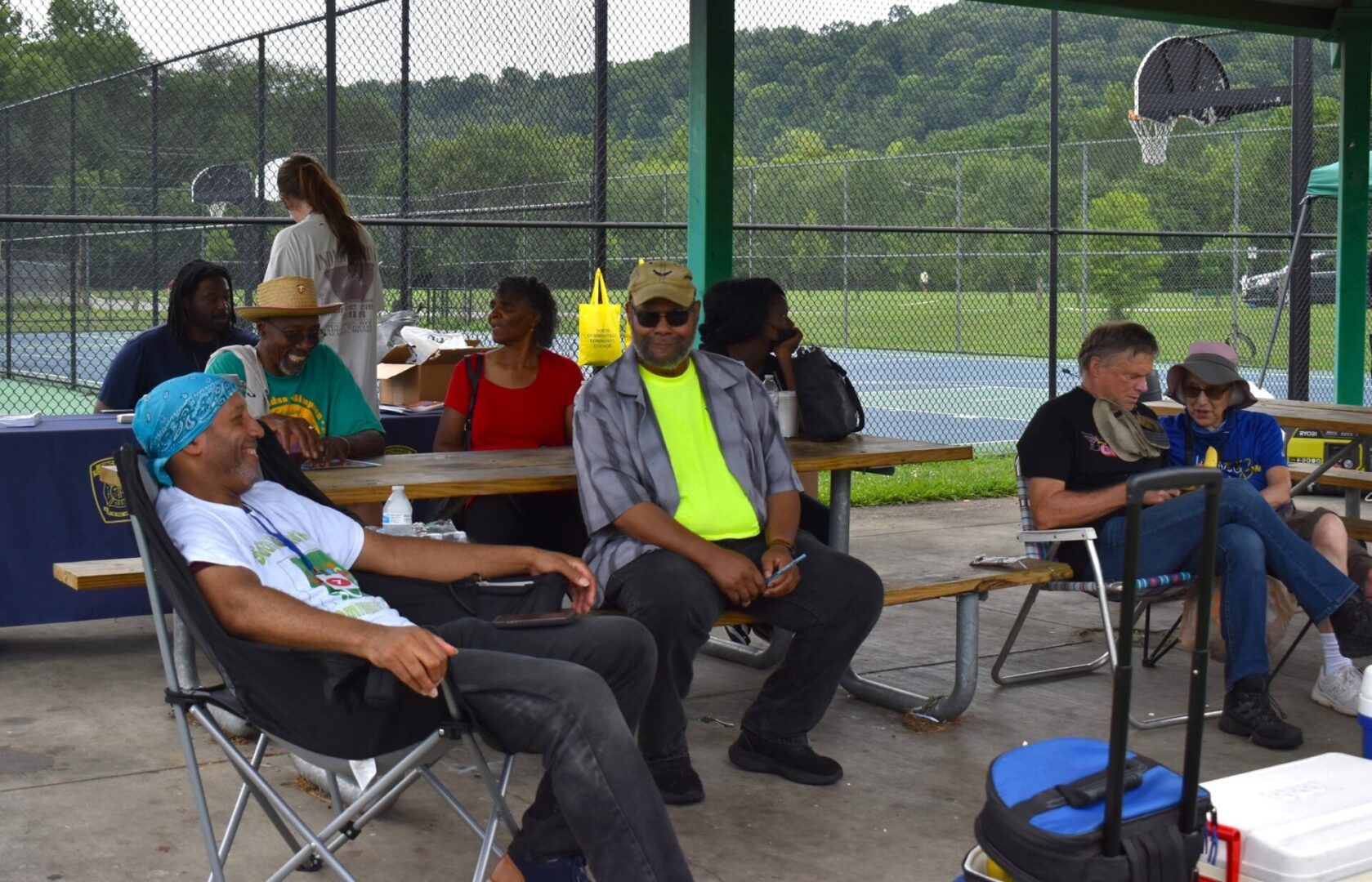 Group relaxing at a park picnic