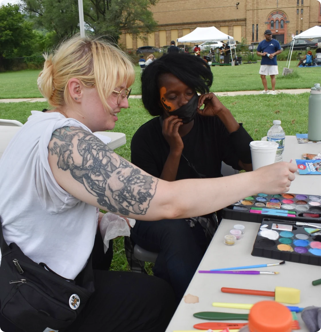 Creative face painting activity outside